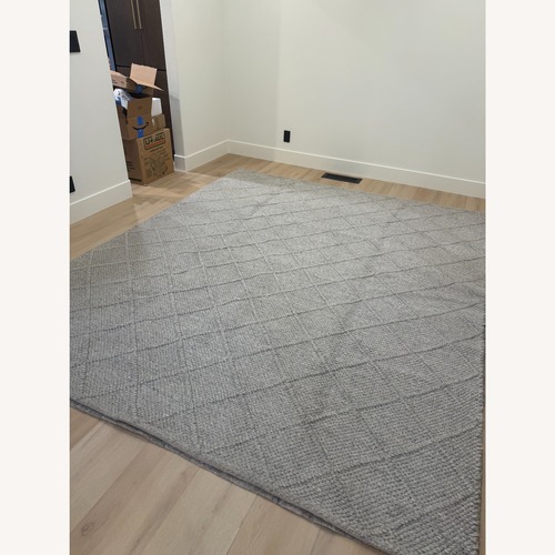 Used Light Gray Wool Area Rug 8' x 10' for sale on AptDeco