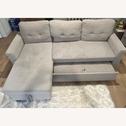 Used Light Gray Sleeper Sectional Sofa with Storage for sale on AptDeco