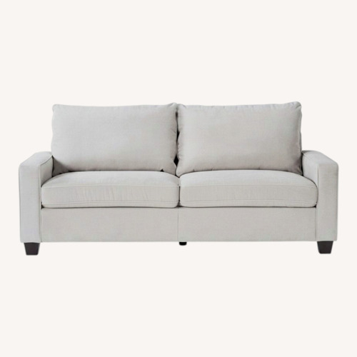 Used Living Spaces Reid Buff Beige Fabric 80" Sofa | Track Arms for sale on AptDeco