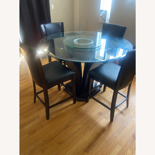 Used Raymour & Flanigan Venice Dark Brown Glass Dining Sets for sale on AptDeco