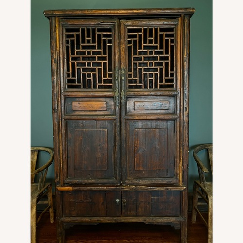 Used Vintage/Antique Finds Dark Brown Wood Armoire for sale on AptDeco