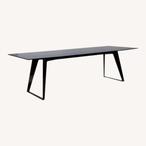 Used Roche Bobois Echoes Black Glass Dining Table for sale on AptDeco