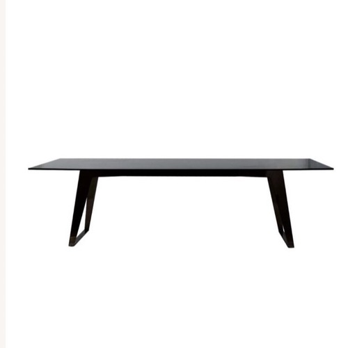 Used Roche Bobois Echoes Black Glass Dining Table for sale on AptDeco