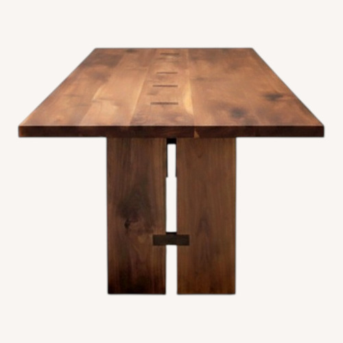 Used Light Brown Wood Dining Table for sale on AptDeco