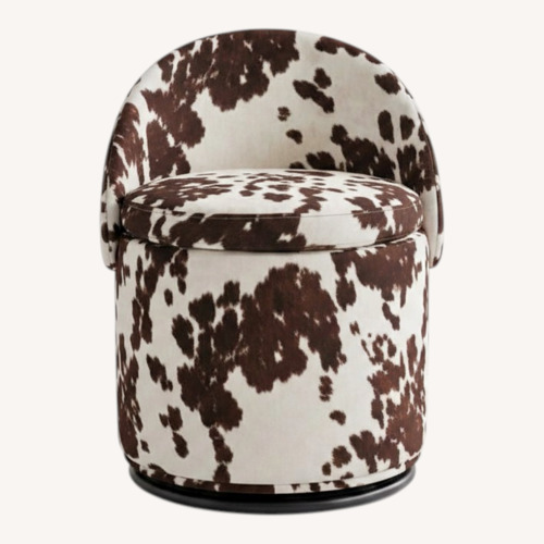 Used Cow Print Swivel Vanity Stool with Storage  for sale on AptDeco