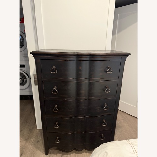 Used Raymour & Flanigan Black Wood Dresser for sale on AptDeco