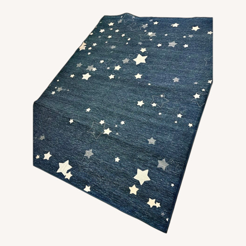 Used Ruggable Blue Area Rug 5' x 7' for sale on AptDeco