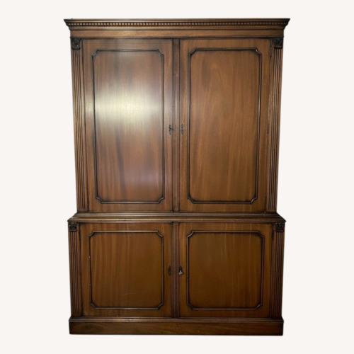 Used Antique Dark Brown Wood Armoire for sale on AptDeco