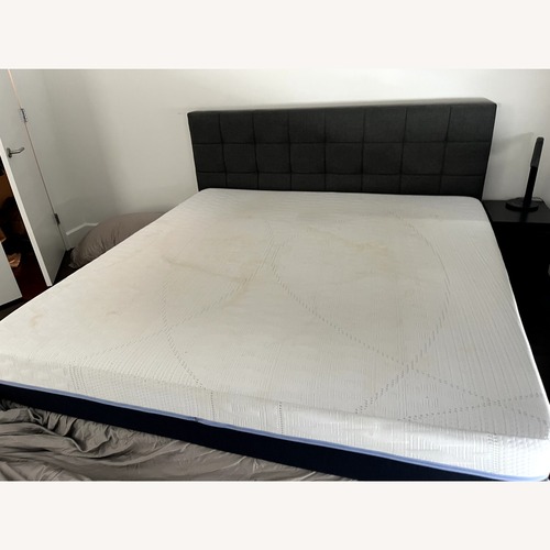 Used Dark Gray Fabric King Bed for sale on AptDeco