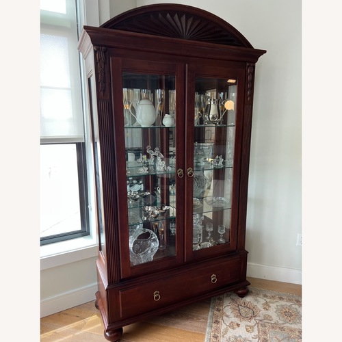 Used Ethan Allen Brown Wood and Glass Display Cabinet for sale on AptDeco