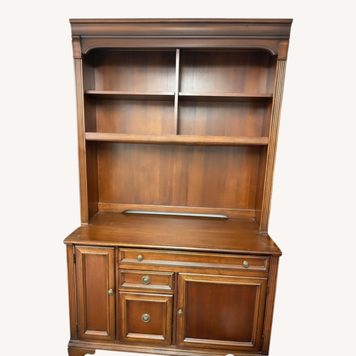 Used Dark Brown Wood Armoire for sale on AptDeco