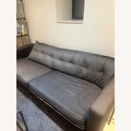 Used Dark Gray Sofa Bed Modern and Compact for sale on AptDeco