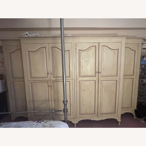 Used Custom Hand PaintedWhite Wood Armoire for sale on AptDeco