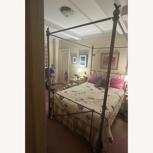 Used Artist’s Dark Gray Metal Queen Canopy Bed for sale on AptDeco