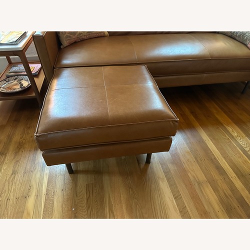 Used West Elm Axel Light Brown Leather Ottoman for sale on AptDeco