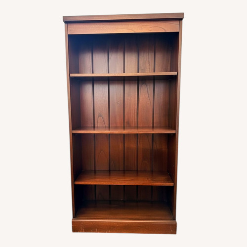 Used Raymour & Flanigan Dark Brown Wood Bookcase for sale on AptDeco