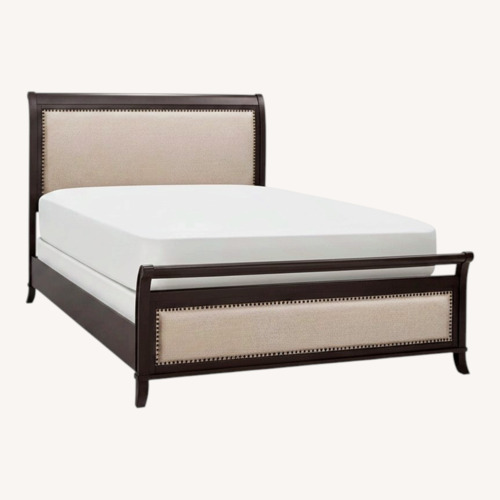 Used Raymour & Flanigan Dark Brown Wood Queen Bed for sale on AptDeco