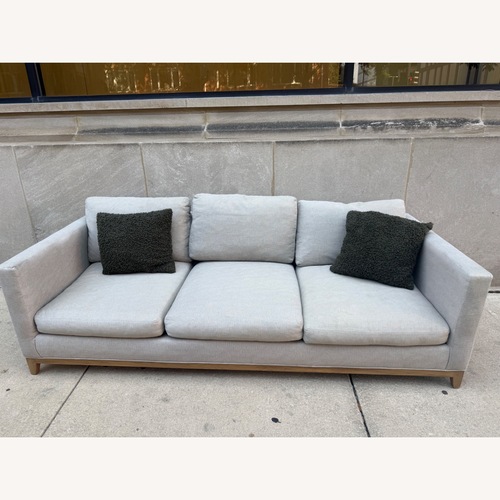 Used Crate & Barrel Natural Pacific Wood Base Couch for sale on AptDeco