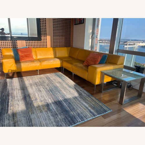 Used Yellow Leather 2 Piece Sectional for sale on AptDeco