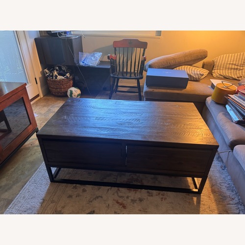 Used Dark Brown Wood Coffee Table for sale on AptDeco