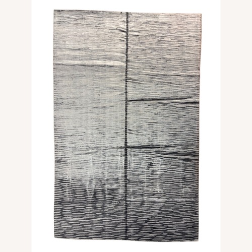 Used Black Area Rug 9' x 14' for sale on AptDeco
