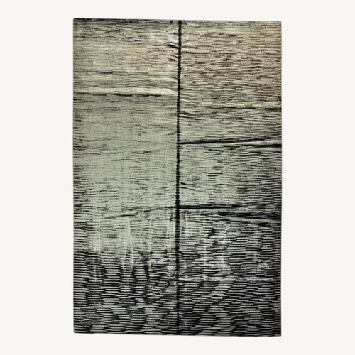 Used Black Area Rug 9' x 14' for sale on AptDeco