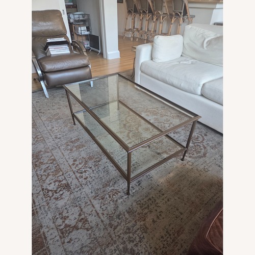 Used Crate & Barrel Pia Dark Brown Metal Coffee Table for sale on AptDeco