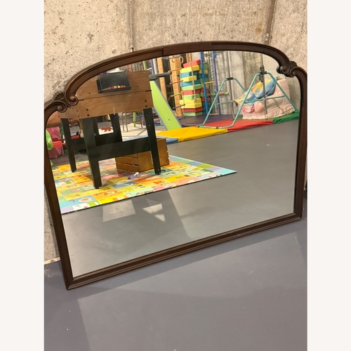 Used Vintage/Antique Finds Dark Brown Wood Wall Mirror for sale on AptDeco