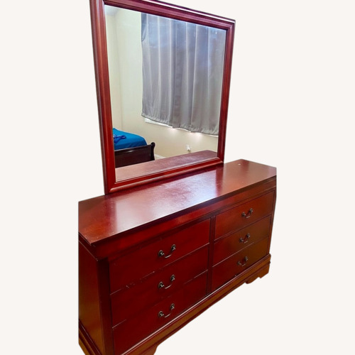 Used Raymour & Flanigan Dark Brown Dresser for sale on AptDeco