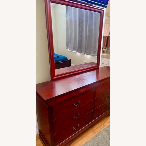 Used Raymour & Flanigan Dark Brown Dresser for sale on AptDeco