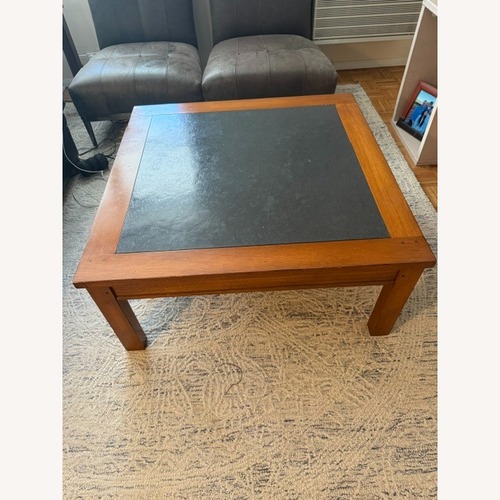 Used Ethan Allen Dark Brown Stone Coffee Table for sale on AptDeco
