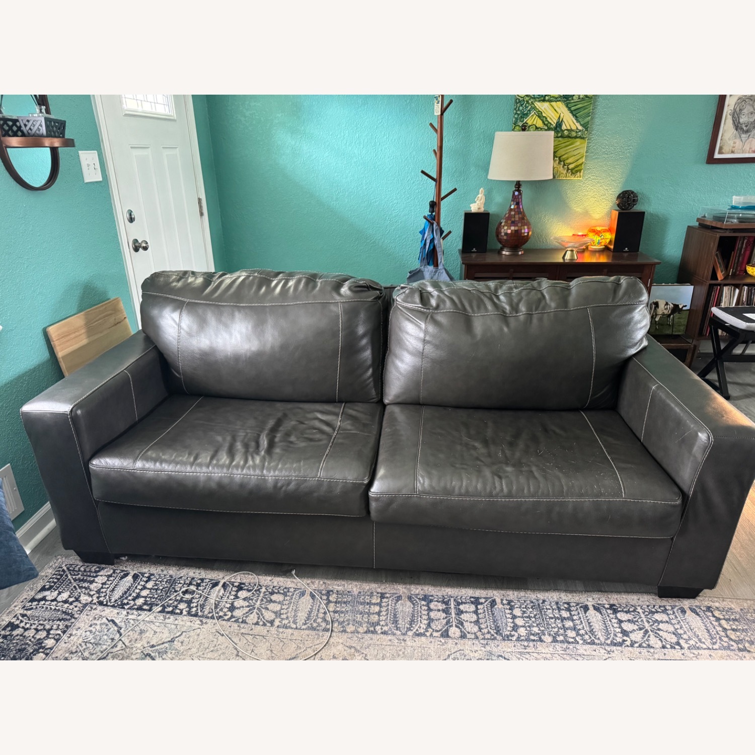 Ashley Furniture Dark Gray Leather 2 Seater Sofa - image-1