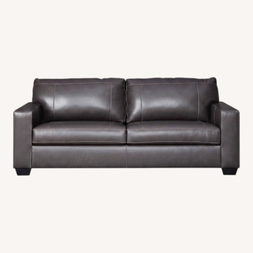 Used Ashley Furniture Dark Gray Leather 2 Seater Sofa for sale on AptDeco