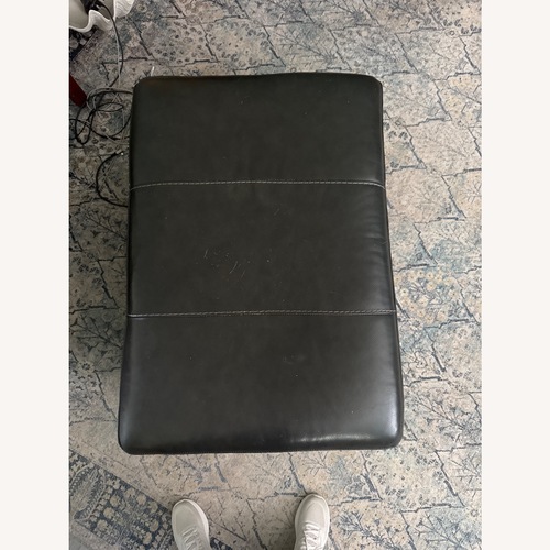 Used Ashley Furniture Dark Gray Ottoman for sale on AptDeco