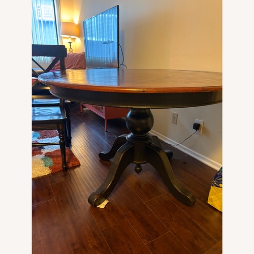 Used Vintage Solid Wood Black and Brown Dining Set for sale on AptDeco