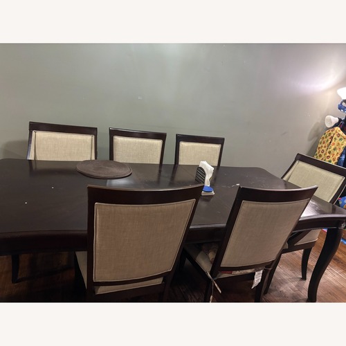 Used Bob's Discount 7 Piece Dining Set with Extendable Table for sale on AptDeco