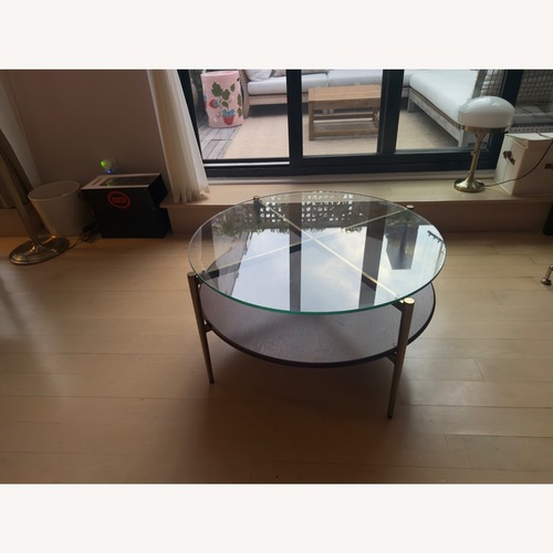 Used West Elm Dark Brown Glass Coffee Table for sale on AptDeco