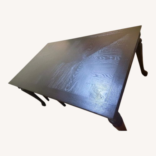 Used Raymour & Flanigan Dark Brown Wood Dining Table for sale on AptDeco