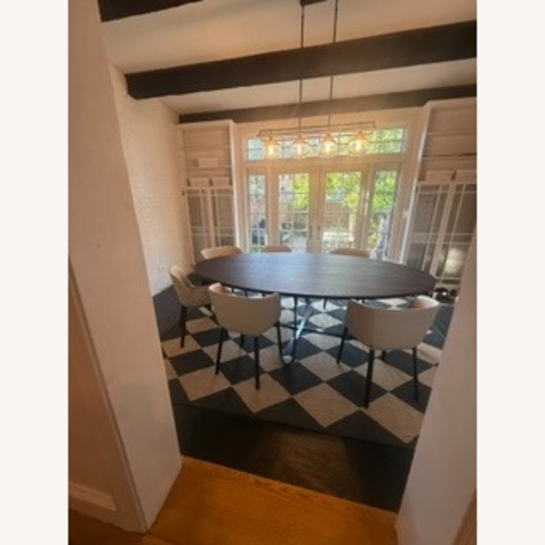 Used Pianca USA Oval Confluence Elliptical Dining Set for sale on AptDeco
