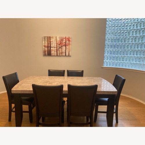 Used Havertys Whitney Stone Dining table with Chairs for sale on AptDeco