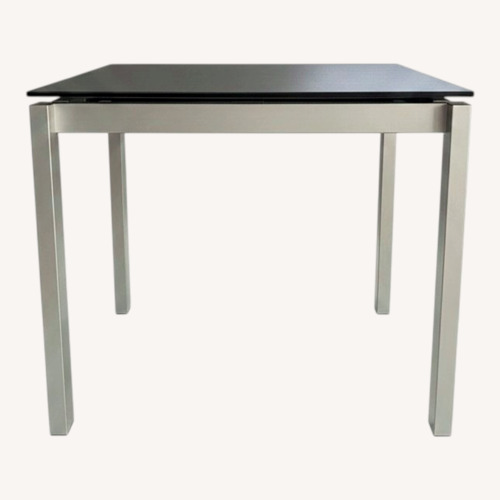 Used Jensen Lewis Black Ceramic Expandable Dining Table for sale on AptDeco