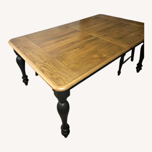 Used Light Brown Wood Dining Table for sale on AptDeco
