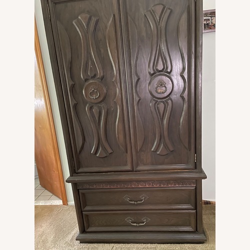 Used Vintage Dark Brown Wood Armoire for sale on AptDeco