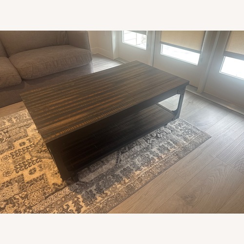 Used Dark Brown Metal Coffee Table for sale on AptDeco