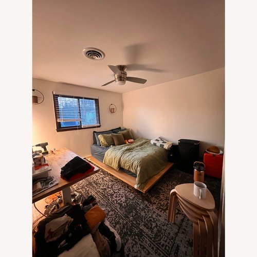 Used Floyd Natural Wood Queen Bed for sale on AptDeco