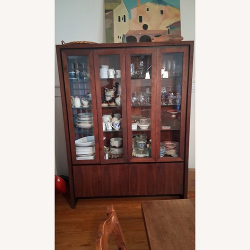 Used Vintage/Antique Dark Brown Wood Armoire for sale on AptDeco