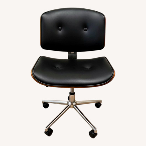 Used Black Leather Office Chair with Wood Backing for sale on AptDeco