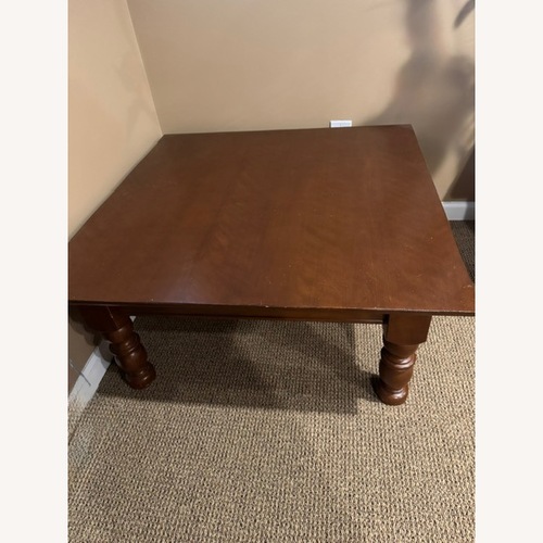 Used Pottery Barn Francisco Mahogany Brown Coffee Table for sale on AptDeco