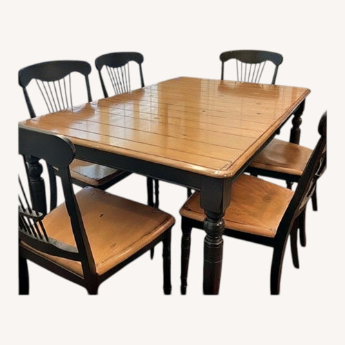 Used Oscar Huber Black/Natural All Wood Dining Set for sale on AptDeco