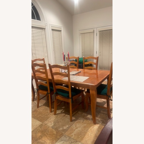 Used Bassett Good Light Brown Wood Dining Table for sale on AptDeco